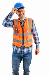 vertical Construction worker greeting the camera while touching his helmet wearing orange vest