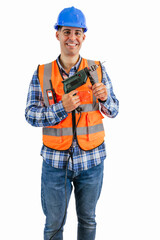 vertical Smiling construction worker holding a drill wearing orange vest and safety helmet