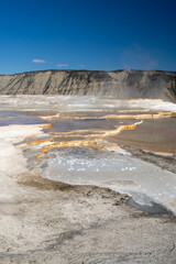 Views of Mammoth Hot Springs on a sunny day at Yellowstone National Park.