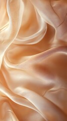 Fototapeta premium A close-up of soft, flowing cream-colored silk with subtle shimmering light reflections