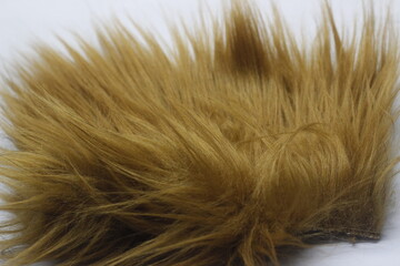 photo of synthetic material with brown orangutan fur for industrial purposes