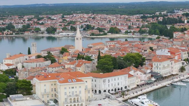 Aerial drone video of the coastal town named Porec in Istria, Croatia.