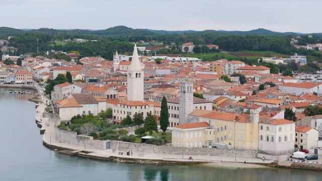 Aerial drone video of the coastal town named Porec in Istria, Croatia.