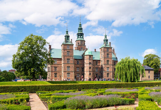 Copenhagen, Denmark - July 17, 2024: Northern facade of the Rosenborg palace, a renaissance castle completed in 1624 for Christian IV, King of Denmark and Norway, seen from the rose garden.