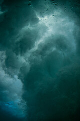 Burst of bubble underwater after breaking wave.