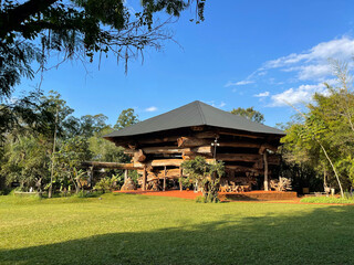 A huge wooden hut in a park in the city of Iguazu, Argentina