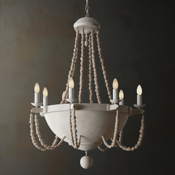 a white chandel with wooden beads hanging from the front
