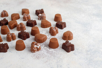 Handmade chocolate with pistachios, dark and milk chocolate pieces.