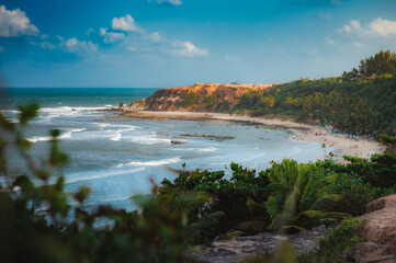 Beach seen from the top of the mountain, blue sky, nature, mountain, cliffs, trees, Tropical climate, summer climate, beach day - Photo in Praia da Pipa - RN, Brazil