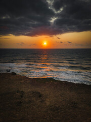 sunrise with clouds, Beach, blue sky, nature, mountain, cliffs, Tropical climate, Summer climate, Dramatic clouds - Photo in Praia da Pipa - RN, Brazil