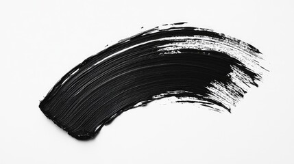 Creative black paintbrush stroke with textured details on a bright white canvas, emphasizing simplicity