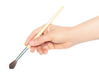 Woman hand holds paint brush, isolated on transparent background, painting and design concept