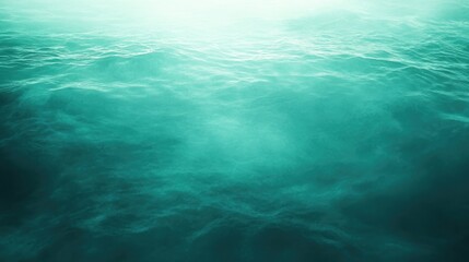 Obraz premium Sea green background with a slight gradient effect, creating a tranquil and refreshing appearance