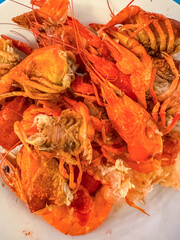 a plate of shells eaten boiled crayfish. High quality photo