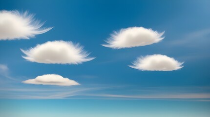 A clear blue sky adorned with soft, white clouds floating gently.