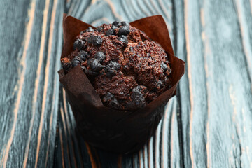Sweet Baked chocolate muffins ( cupcake )  . Top view