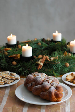 Traditional Czech and Slovak Christmas sweet plaited bread called vanocka (in Slovak vianocka). Handmade Christmas pastry on a festively set table.