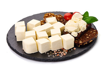 Soft greek feta cheese, isolated on white background