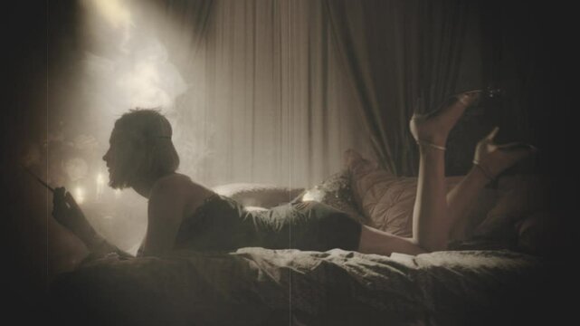 Old film 20s style black and white color. Retro lady lying on bed long legs waving flare light Happy sexy woman shadow silhouette sexy Girl body. night room full smoke 1920s roarind twenties party 4k