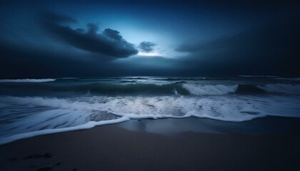 Fototapeta premium Waves crashing on a beach at night