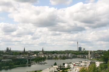 Obraz premium Phoenix See, Dortmund, Germany. A view over Dortmund city from an artificial hill next to the lake.
