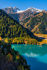 Fototapeta premium Top view of the picturesque Lake Issyk in the outskirts of the Kazakh city of Almaty on an autumn morning