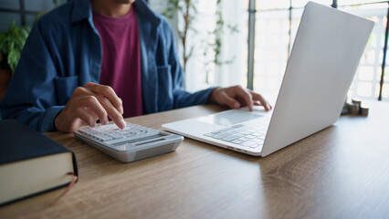 Business man accountant financial analyst and auditor working and laptop for calculating 