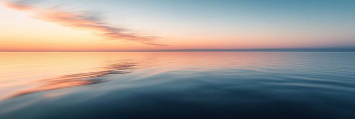 Obraz premium Serene Sunset Over Tranquil Lake, vivid reflections on the water, horizon softly blending into warm hues, peaceful evening atmosphere