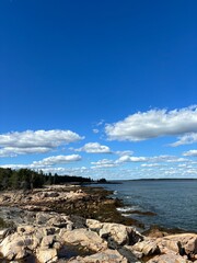 The rocky shoreline at a cove in Down East Maine 
