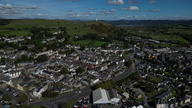 4K: Aerial Drone Video of Ulverston in Cumbria, England, UK. Circular Video of the Town Centre and Hoad Monument in distance. Stock Video Clip Footage