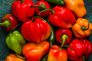 Colorful peper on green background