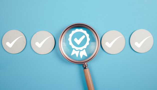 Certificate with check mark guarantee icons on wooden cubes, International Organization for Standardization ISO and quality control certification concept, Sign of top service quality assurance.
