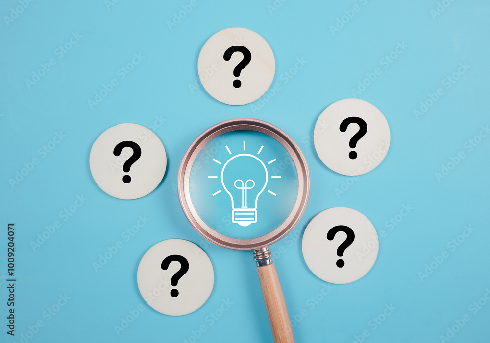Poster glowing light bulb inside magnifier glass among question mark for focus and concentrate of creative 