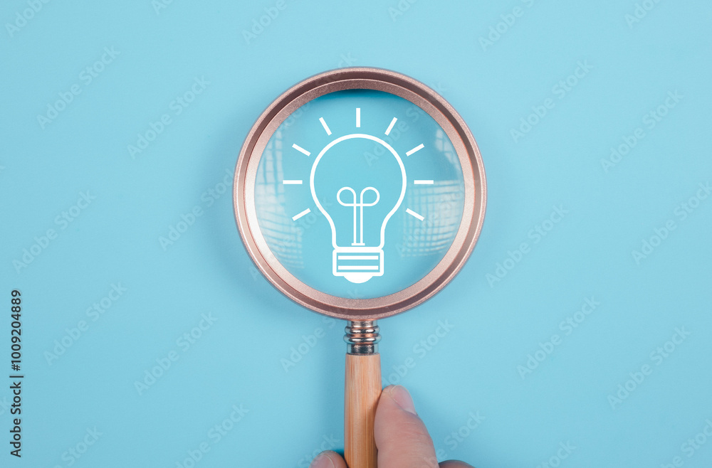Poster idea light bulb icon on magnifying glass. idea and new design concept on clean background..