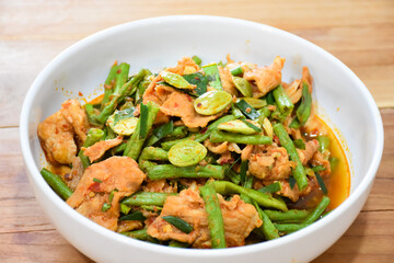 Thai food: Stir-fried pork with curry paste and green beans, very spicy.