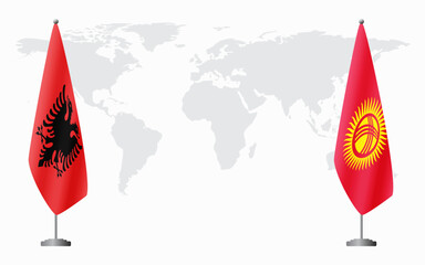 Obraz premium Albania and Kyrgyzstan flags for official meeting against background of world map.