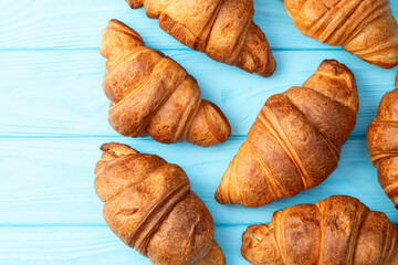 Group of sweet croissant . French morning breakfast . Top view