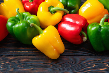 Fresh sweet bell pepper ( paprika ) photography red , green and yellow . Colorful vegetable . Top view
