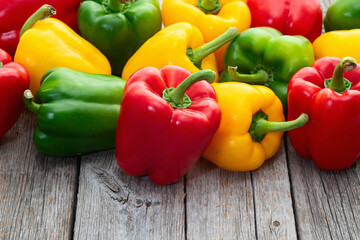 Fresh sweet bell pepper ( paprika ) photography red , green and yellow . Colorful vegetable . Top view