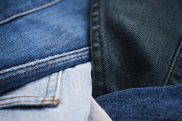 Fototapeta premium Texture background of jeans. Denim jeans fashion background. Canvas denim texture. Denim jeans texture. Denim fabric textured background.