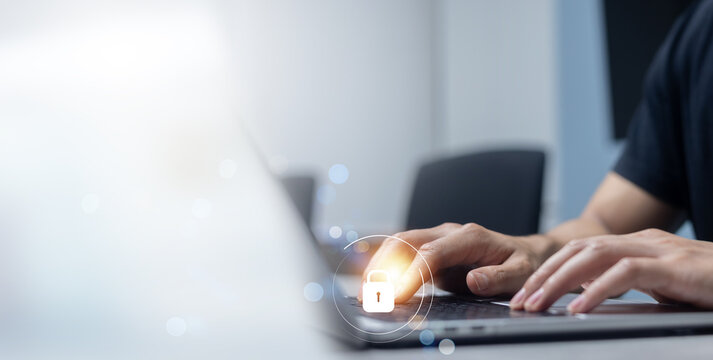 programmer man hand type keyboard to input code or data for register and unlock system password on laptop in office operation room with virtual reality interface for cyber security and safety concept - Powered by Adobe