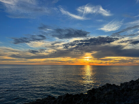 Amazing sunset sky and shiny sea.