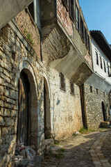 An historic house with half-timbered jettying overhanging a lane in the Gorica quarter of Berat in...