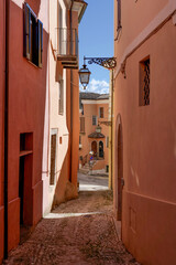 Fototapeta premium A street between the old houses of Fontechiari in Lazio, Italy.