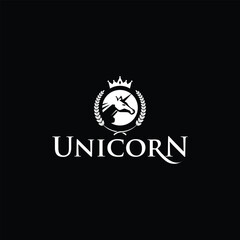 Fototapeta premium Regal Unicorn Logo Design with Crown and Laurel in Elegant Typography