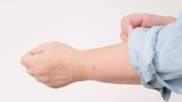 Focused hands woman confidently unbuttoning denim blouse and rolling up sleeves, ready to tackle task, Detail hands preparing for workday, preparation manual process