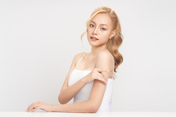 Obraz premium Beautiful young asian woman with clean fresh skin on white background, Face care, Facial treatment, Cosmetology, beauty and spa, Asian women portrait.