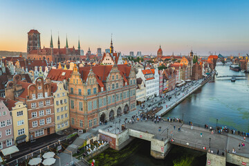 View of the Main Town in Gdańsk. Beautiful tenement houses, Motława at sunset. © Kamil