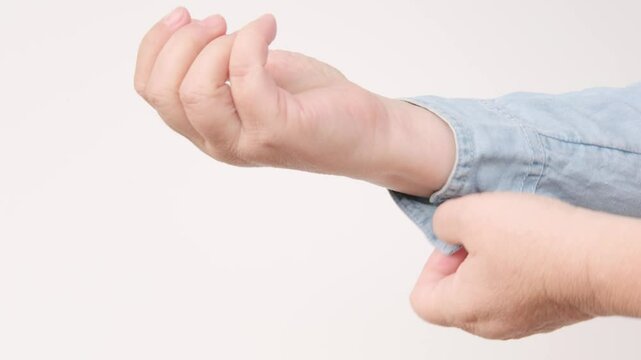 Focused hands woman confidently unbuttoning denim blouse and rolling up sleeves, ready to tackle task, Detail hands preparing for workday, preparation manual process