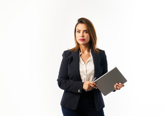 A woman in a business suit holding a tablet